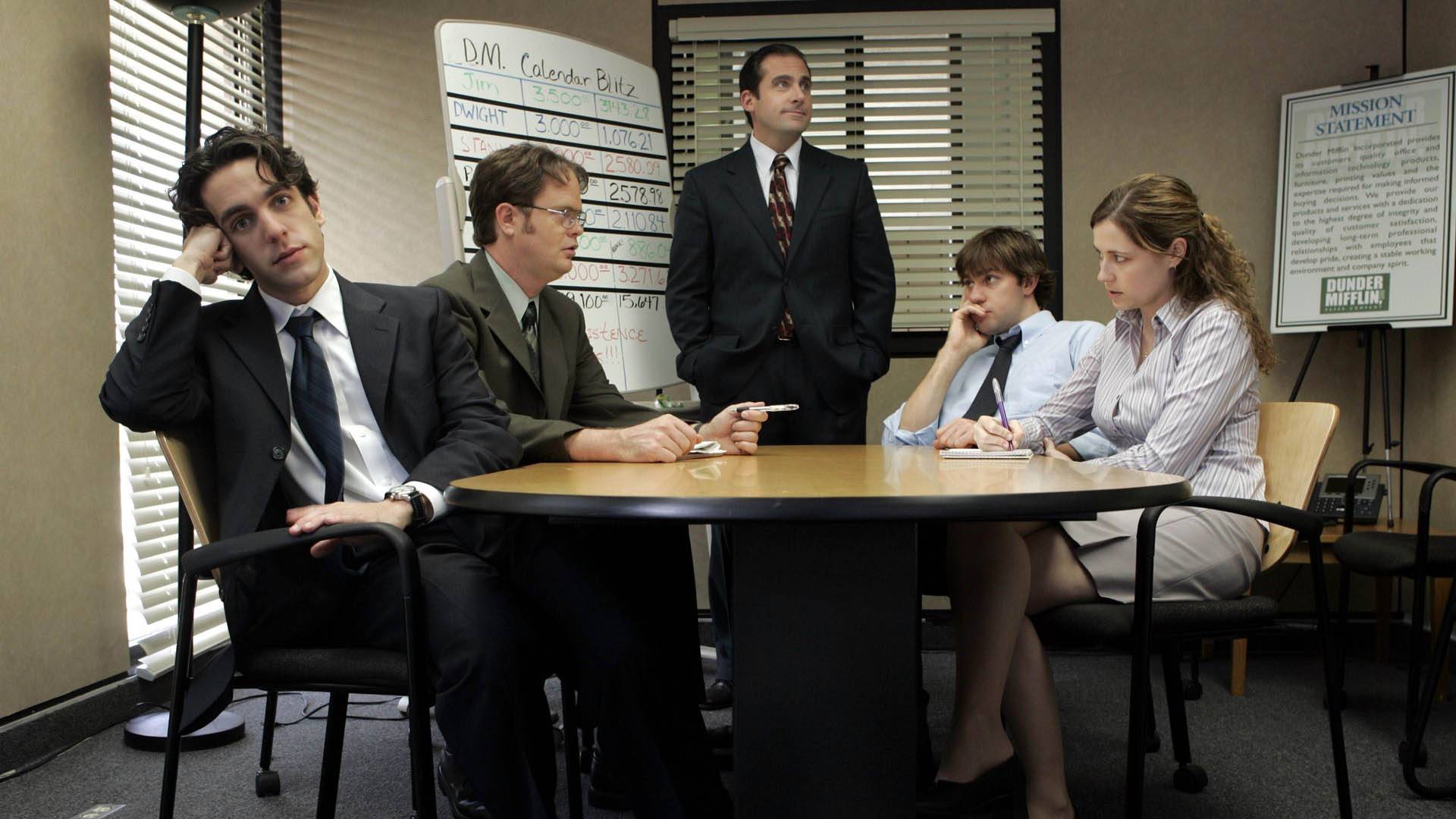 A last supper styled shot of the Dunder Mifflin conference room, with Michael clearly annoying his team.